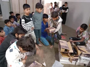 Volunteers preparing shoes for distribution.